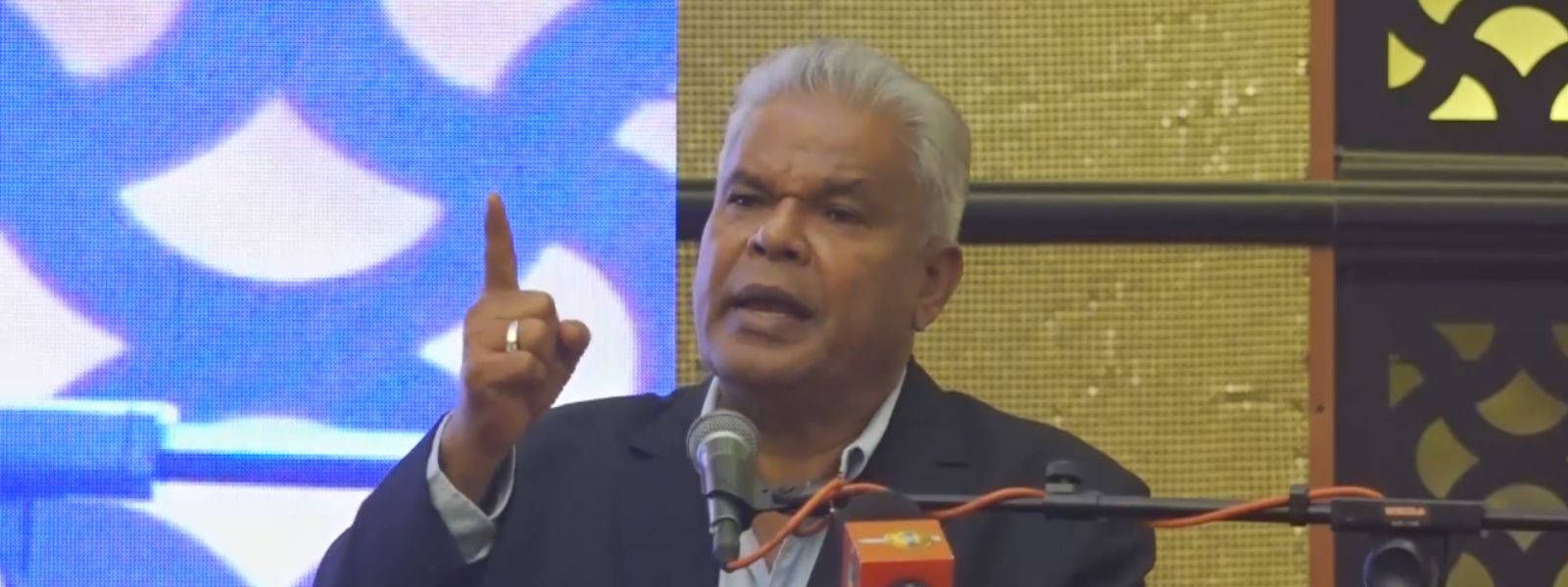 Dudley Links SL’s Economic Crisis to Bond Scam
